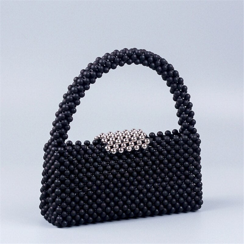 sac perle noir chic