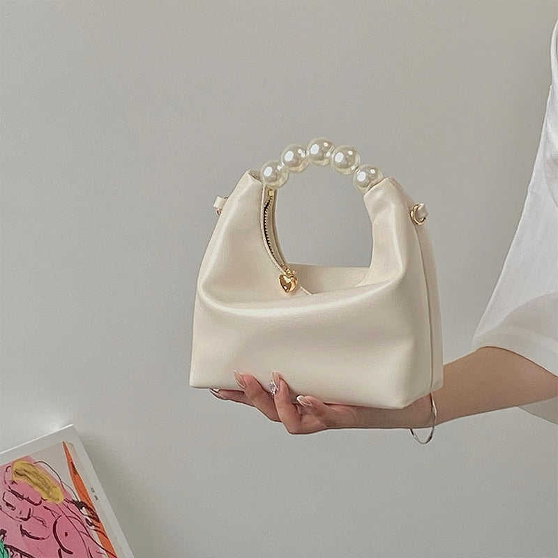 Mini sac en cuir et perles dorée
