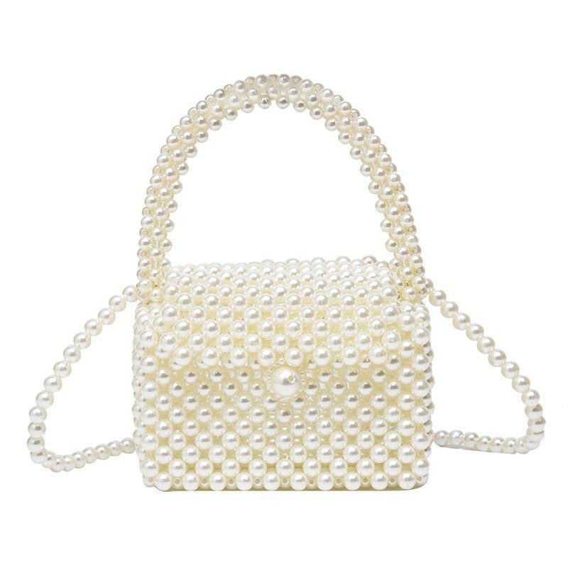 Mini sac en perle blanche porté à la main, avec anse rigide et chaînette épaule, format 15x9x8 cm, idéal pour cérémonie ou soirée