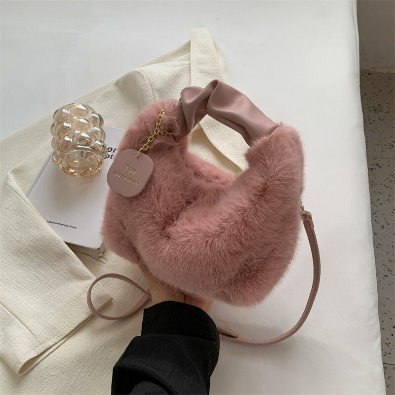 Sac à main fausse fourrure rose