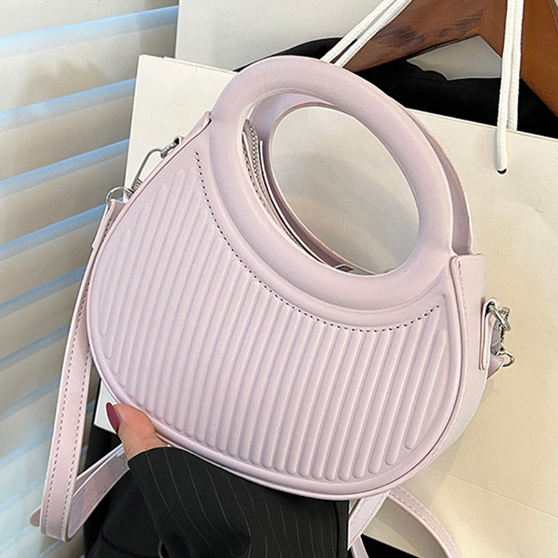 Petit sac rond en cuir fashion violet