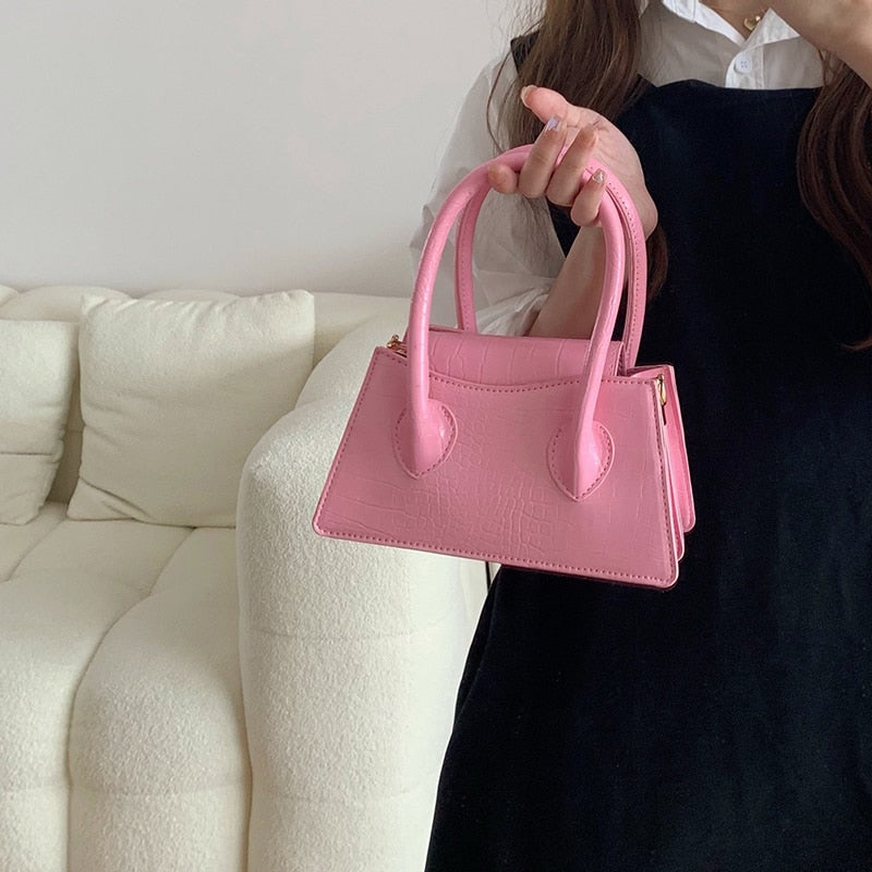 Petit sac à main en cuir rose