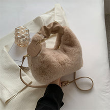 Sac à main fausse fourrure beige